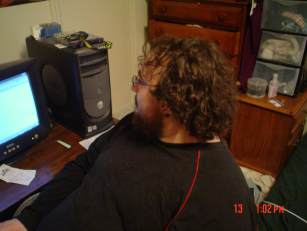 Doug sitting at computer desk