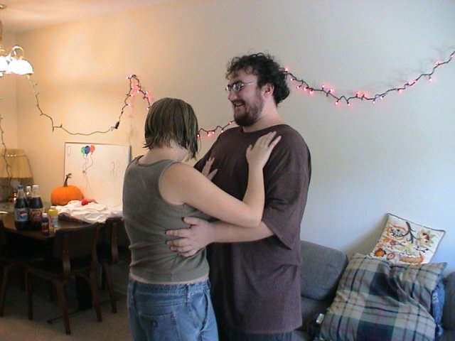 Doug and Sarah in their apartment